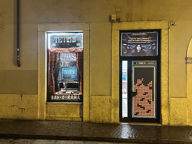 Tetris living room diorama with CRT television in storefront window